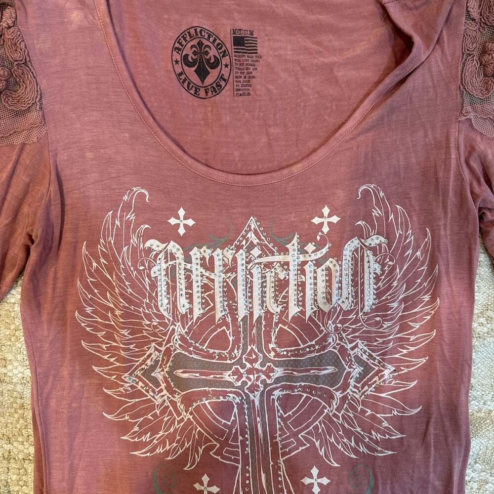 Affliction Women's Lace Shoulder Winged Cross Graphic Long Sleeve Top
